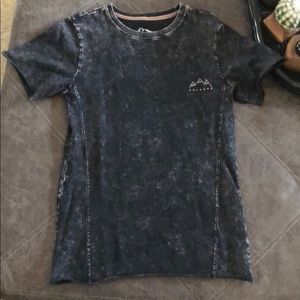 Acid washed tee with wording.